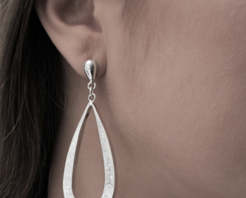 Bella Open Hammered Tear EarringSterling Silver earrings and necklace